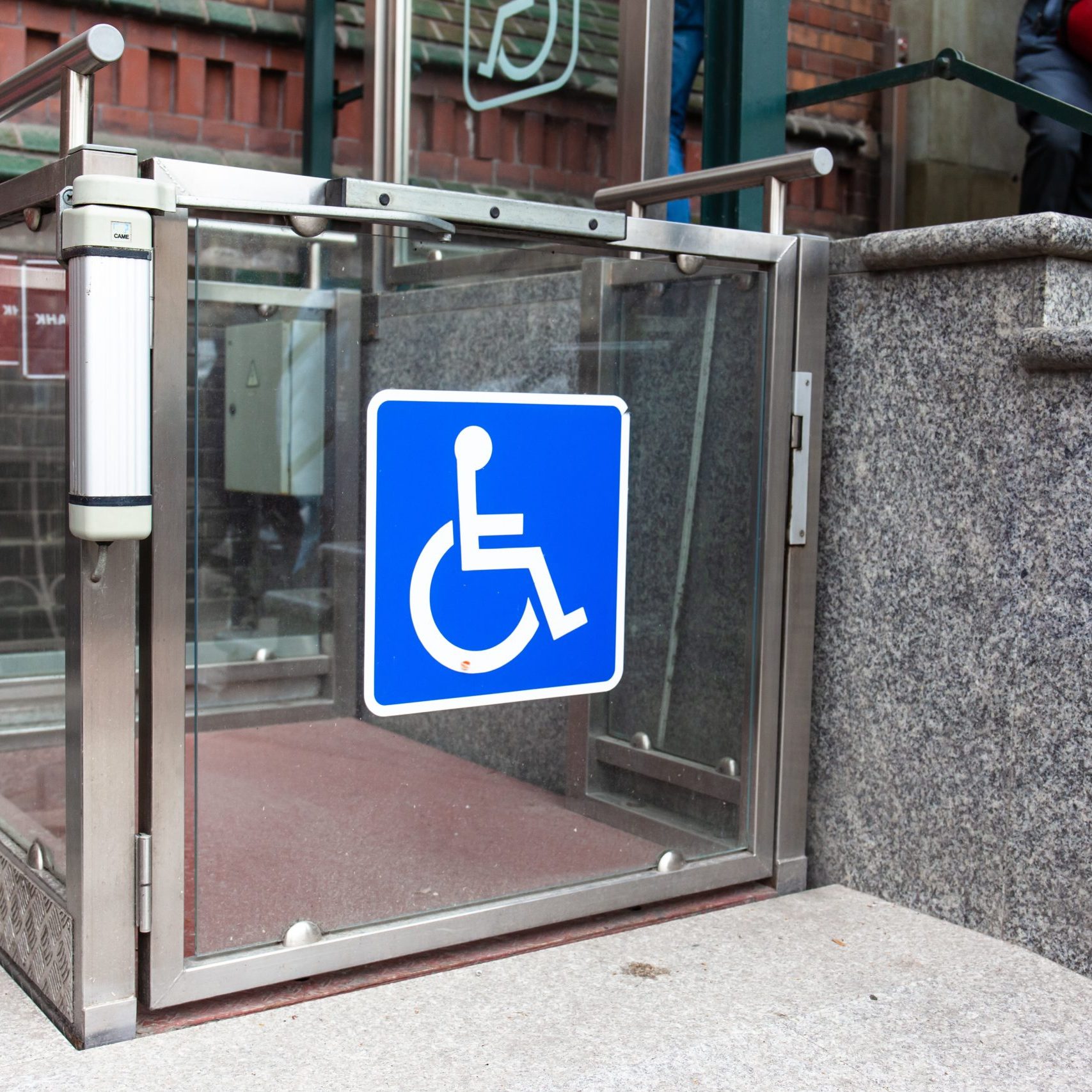 modern wheelchair lift near the building